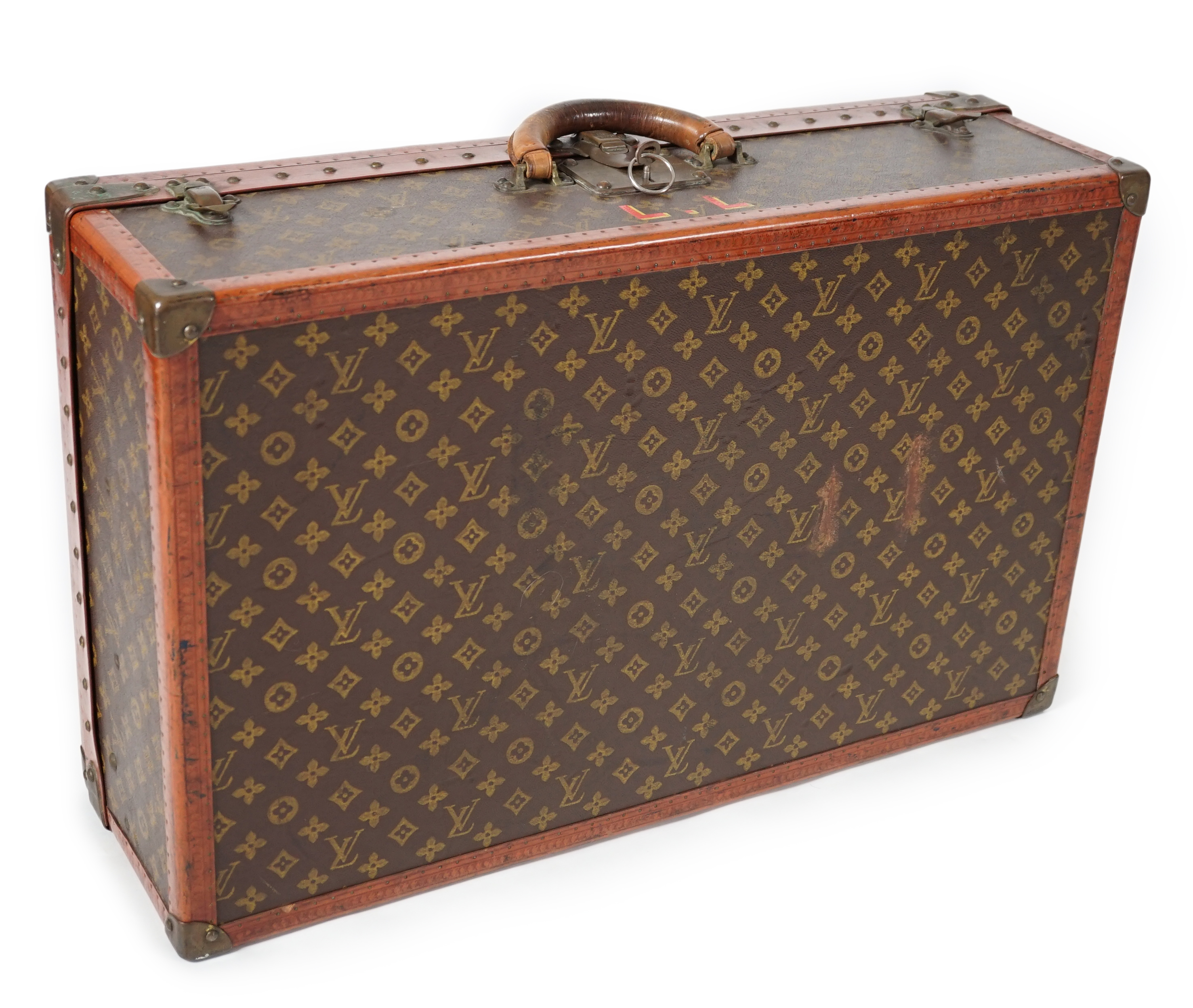 A vintage Louis Vuitton monogram canvas suitcase, 71cm x 44cm x 22cm